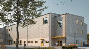 Skissbild som visar idrottshallen vid nya Vätternskolan.